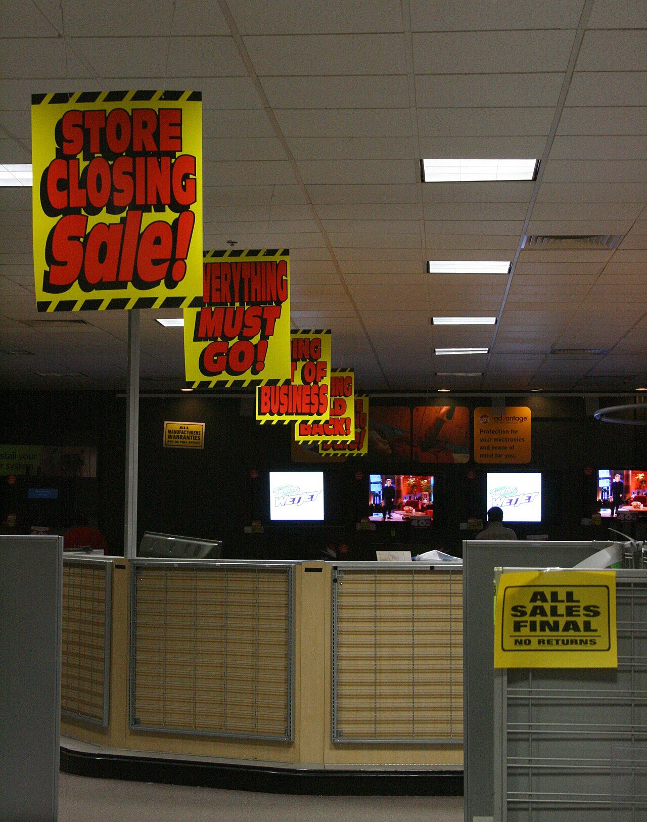 A Circuit City store in 2009 with closing-sale signs covering the windows.