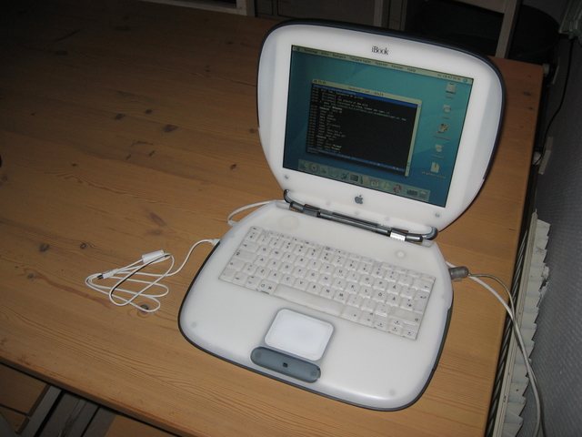 An Apple iBook clamshell laptop, the kind used to browse the web around 1999