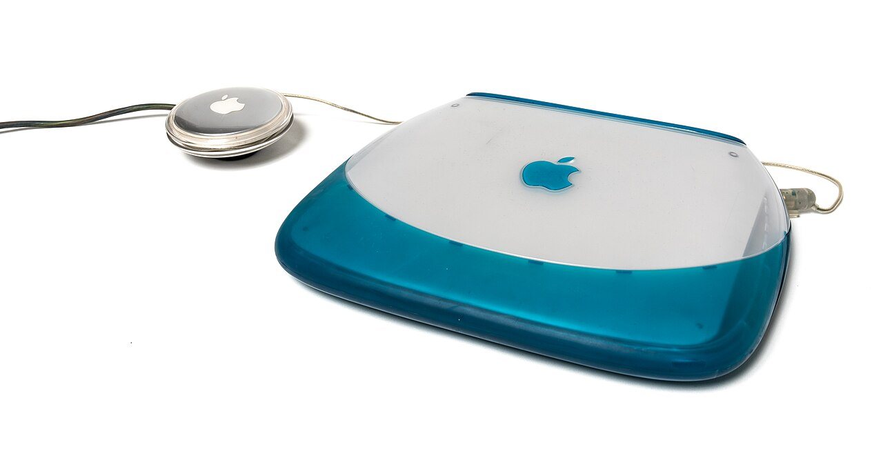 An Apple iBook G3 laptop, the kind of machine used to check webmail in the early 2000s