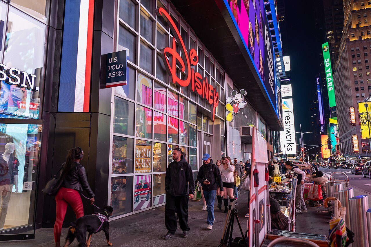 A Disney Store shopfront in a shopping mall, with the chain's name above the entrance