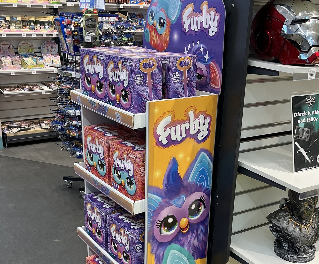 Boxed 2023-generation Furby toys stacked on a purple store display