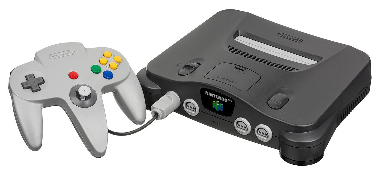 Nintendo 64 console with a grey controller resting in front of it