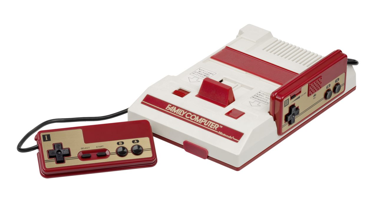 The Japanese Family Computer console with two attached controllers and a cartridge slot, in its red and white livery
