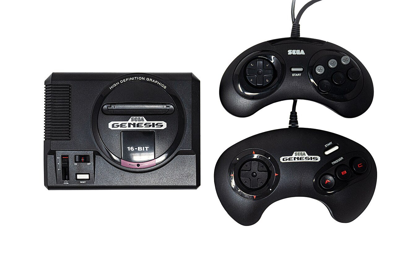 A Sega Genesis Mini plug and play console with its three button controller on a plain background