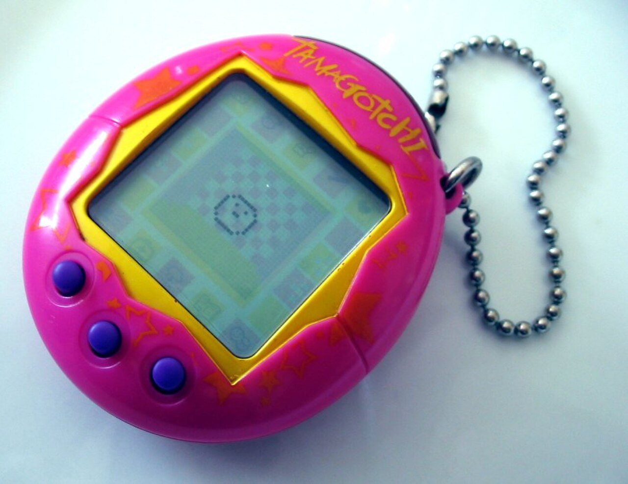 Original Bandai Tamagotchi virtual pet, an egg-shaped keychain with a small liquid crystal screen and three buttons