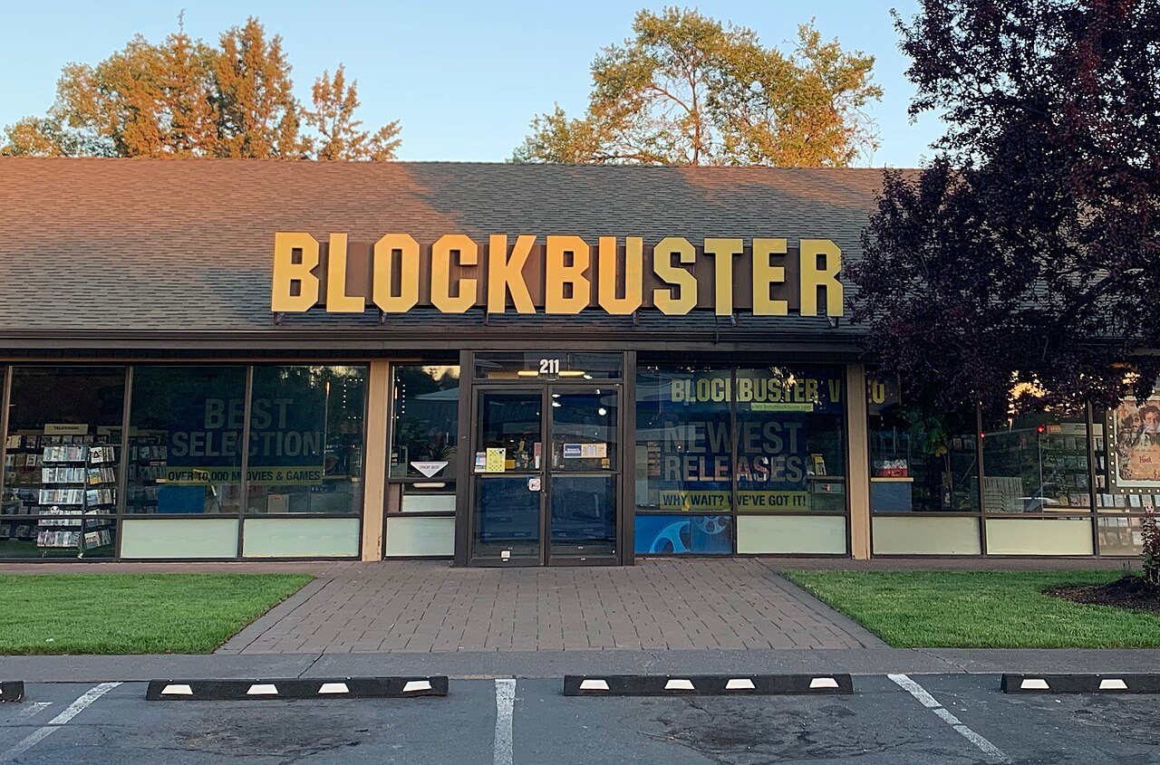 The blue and yellow storefront of the last Blockbuster video store in Bend, Oregon